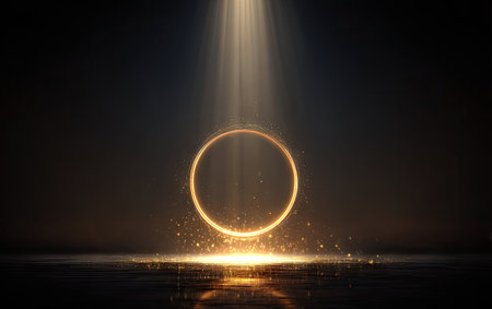 An abstract composition features a glowing golden ring highlighted by a dramatic spotlight. The image showcases a dark background, creating a stark contrast with the illuminated subject. The overall style is modern and digital, with potential applications for various commercial and editorial projects.の素材