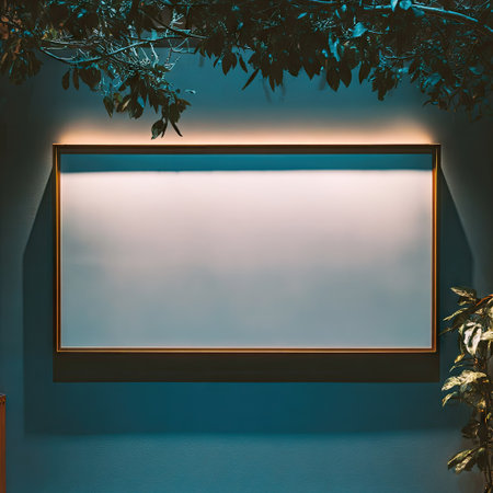 A rectangular, framed board dominates the image, surrounded by lush green foliage, suggesting an indoor setting. The composition features soft lighting that illuminates the board, accentuating its texture. The use of natural elements hints at a harmonious environment, and the visual could be applied for display purposes.の素材