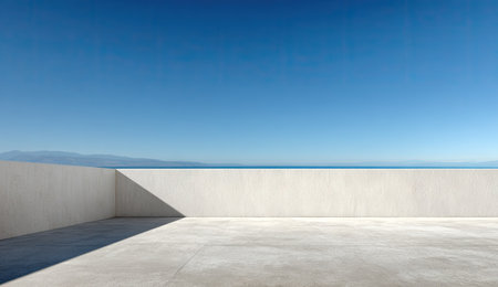 An exterior view showcases a modern, minimalist building design featuring a concrete terrace and white walls. A vibrant blue sky fills the background. The scene suggests a sunny, outdoor environment. Suitable for a range of uses including architectural, design, and commercial projects.の素材