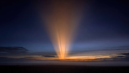 Fantastic sunset with rays of light in the sky over the seaの素材