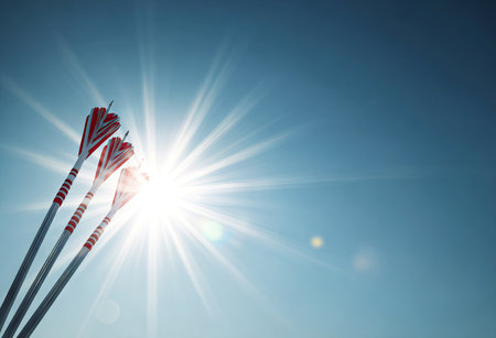 Darts against bright blue sky with clouds, 3d render illustrationの素材