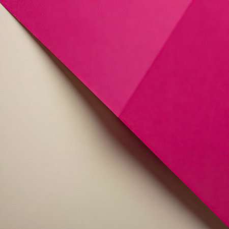 Abstract background made of pink and beige sheets of paper. Flat lay, top view.の素材