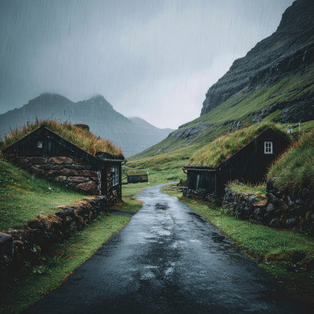 Mystical icelandic landscape with wooden houses in rainy weather.の素材