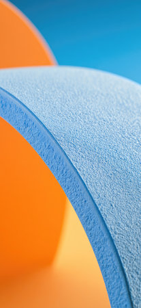 An abstract composition features curving, layered forms in bright orange, blue, and light blue. The surfaces exhibit textures and gradients with a high-angle perspective. The arrangement suggests depth and dimension, possibly suitable for graphic design projects or visual interest elements. The color palette offers a modern and eye-catching aesthetic.の素材