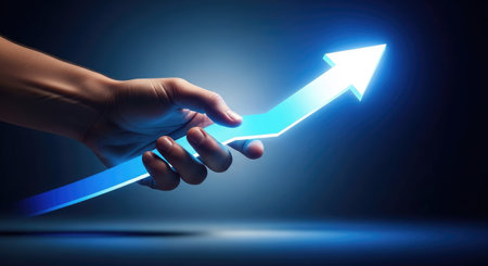 Close up of human hand touching with finger glowing arrow. Success conceptの素材