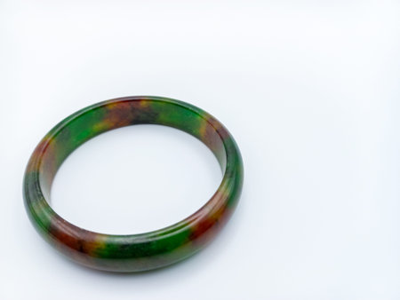 Wooden bracelet on a white background. Isolated object with copy space.