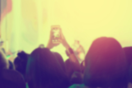 crowd of Audience enjoying music in concert on stageの写真素材