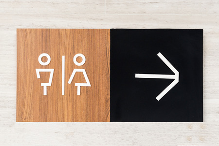 Toilet sign on wallの写真素材