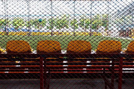 football substitutes seats in indoor soccer stadium.の写真素材