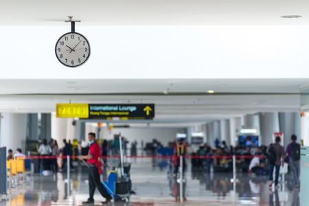 Departure lounge at the airport with traveller and luggageのeditorial素材