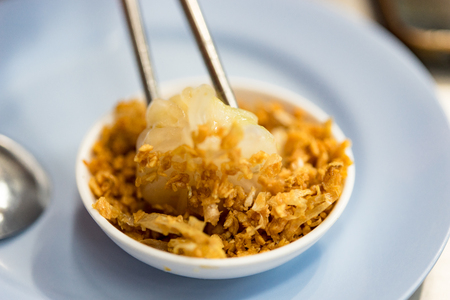 Boiled and hot Chinese dumplings in wooden steamer, Chinese Dim Sumの写真素材