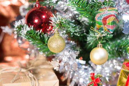 Christmas decorations backdrop merry Xmas Happy new year, Christmas tree and Gift box Gold Bokeh and fireworks backgroundの写真素材