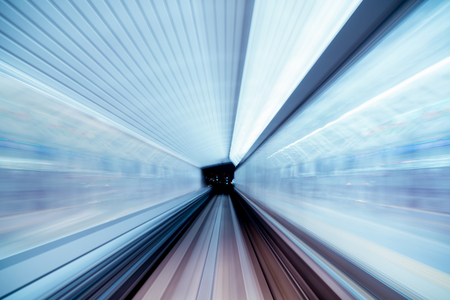 Blurred image of Subway tunnel with Motion blur of a monorail Train futures of transport in modern cityの写真素材