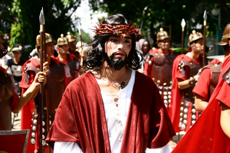 Cainta, Rizal, Philippines. March 29, 2013. An actor playing the role of Jesus in a re-enactment of Christ's crucifixion and death. A tradition in the Philippines called "Senakulo" is held yearly every Holy Week.のeditorial素材