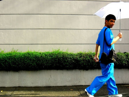 Asian male nurse walkingの素材