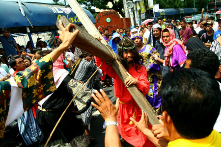 Catholic devotees reenact the death of jesus christ in cainta, rizal, philippines on good friday