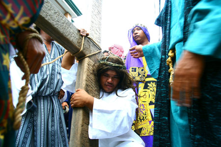 Catholic devotees reenact the death of jesus christ in cainta, rizal, philippines on good friday