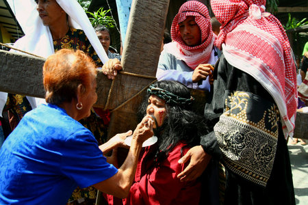 Catholic devotees reenact the death of jesus christ in cainta, rizal, philippines on good friday