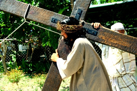 Catholic devotees reenact the death of jesus christ in cainta, rizal, philippines on good fridayの素材