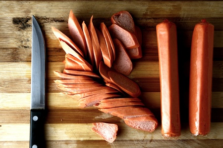 German frankfurters or sausages and a knifeの素材
