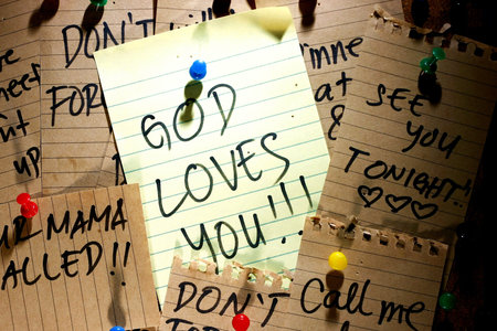 Message or notice board with God loves you note