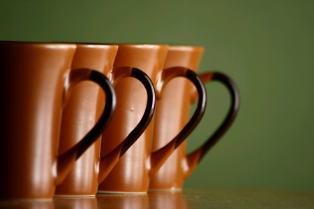 Row of ceramic coffee mugsの素材