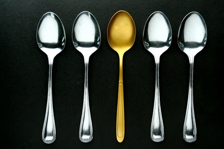 A single Golden spoon among silver spoonsの素材