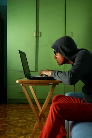 Man working on a laptop computerの写真素材