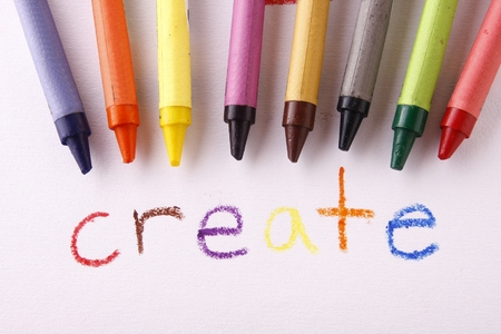 Colorful crayons and the word createの写真素材