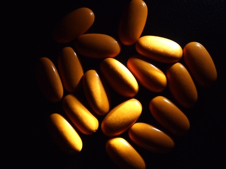 Orange colored medicinal pillsの写真素材