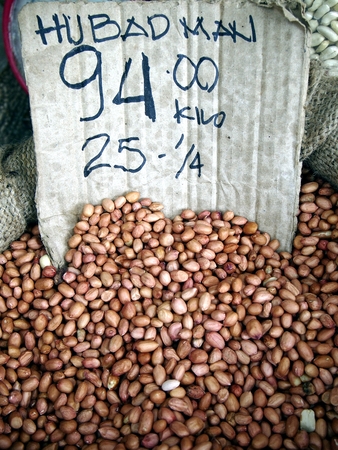 Bunch of raw peanuts sold at a storeの写真素材