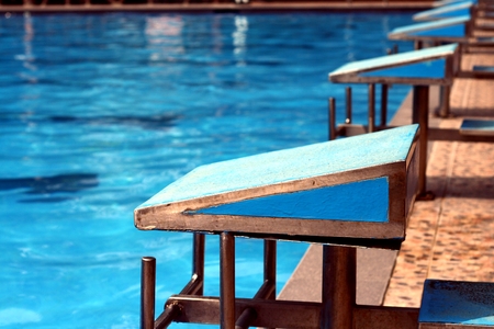 Diving platforms at a swimming poolの写真素材