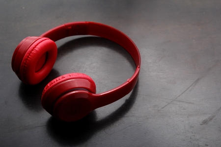 Stereo headphones on a tableの写真素材
