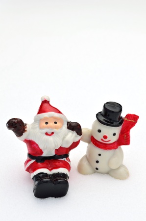 santa claus and snowman on snowの写真素材