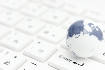 earth on keyboardの写真素材