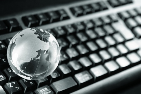 Blue Globe and Computer Keyboard for backgroundの写真素材