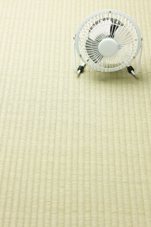 electric fan in front of tatami backgroundの写真素材