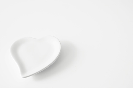 empty white heart plateの写真素材