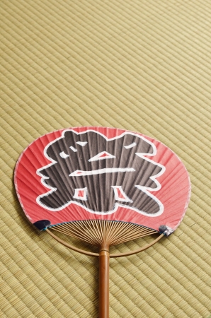 japanese fan uchiwa  on tatamiの素材 [FY31014336860]