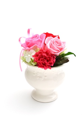 Bunch of pink roses and red isolated on whiteの写真素材