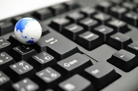 earth on keyboardの写真素材