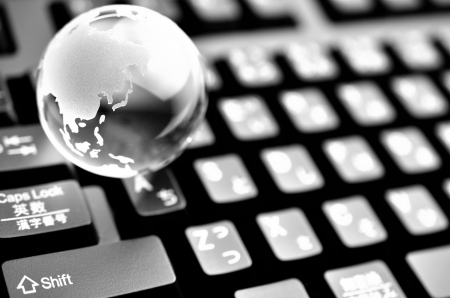 earth on keyboardの写真素材