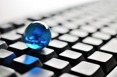 earth on keyboardの写真素材