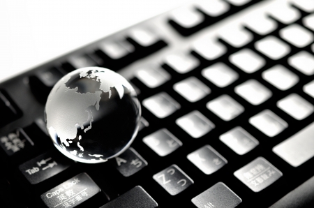 earth on keyboardの写真素材