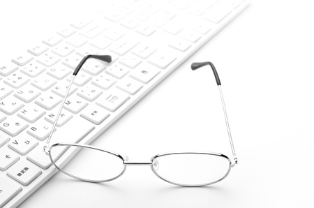 Glasses and keyboardの写真素材