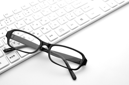 Glasses and keyboardの写真素材