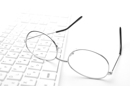 Glasses and keyboardの写真素材