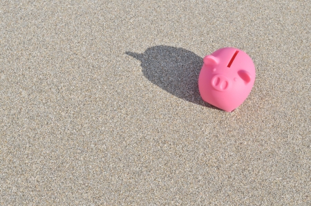 piggy bank on beachの写真素材