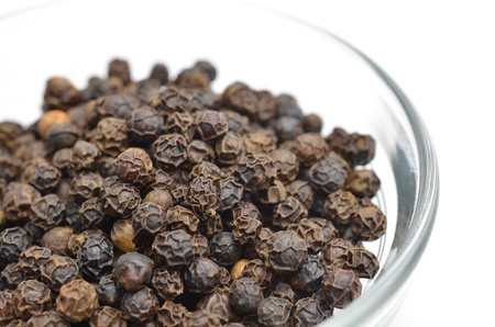 Black pepper isolated on white backgroundの写真素材