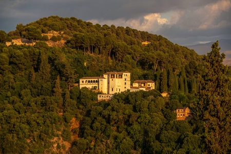 A View of Alhambra's Jannat al-â€˜ArÄ«f Generalife Summer Palace From a Distance at Dawn